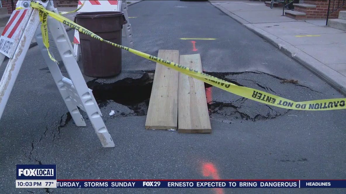 Growing sinkhole in South Philly street sets neighborhood on edge